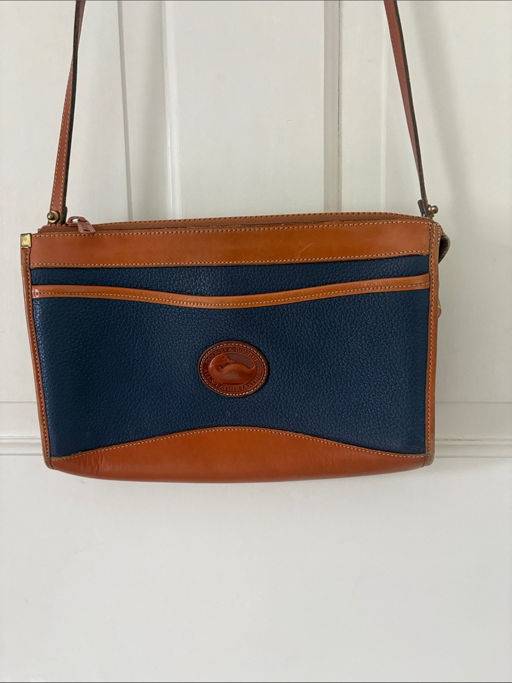 Dooney & Bourke Navy and Tan Leather Crossbody bag